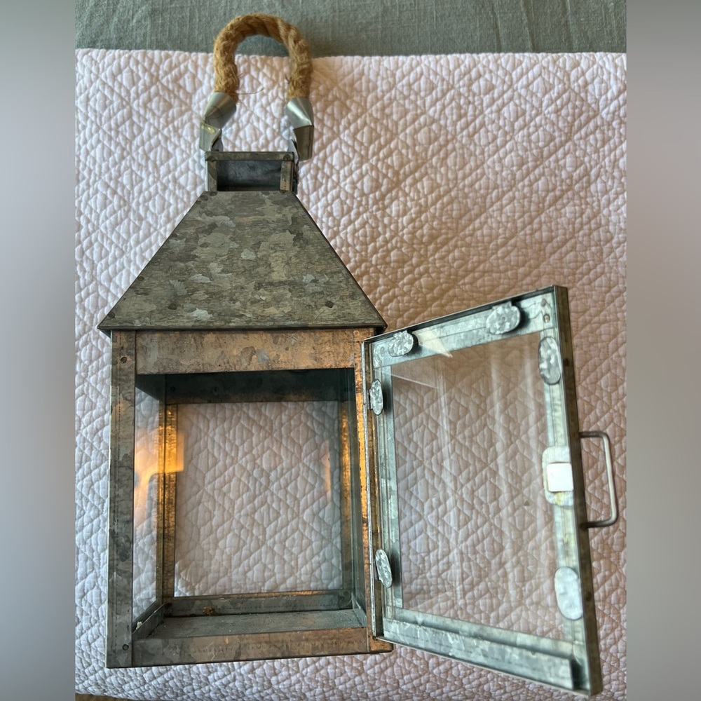 Galvanized lantern with rope handle